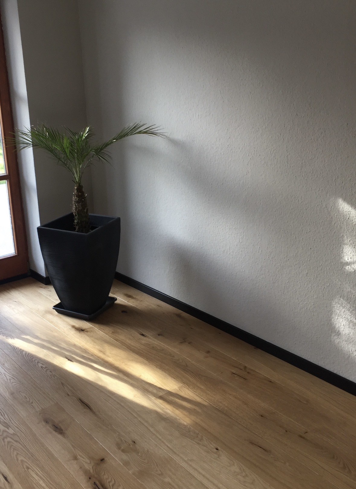 Helles Eichenparkett mit feiner, natürlicher Maserung